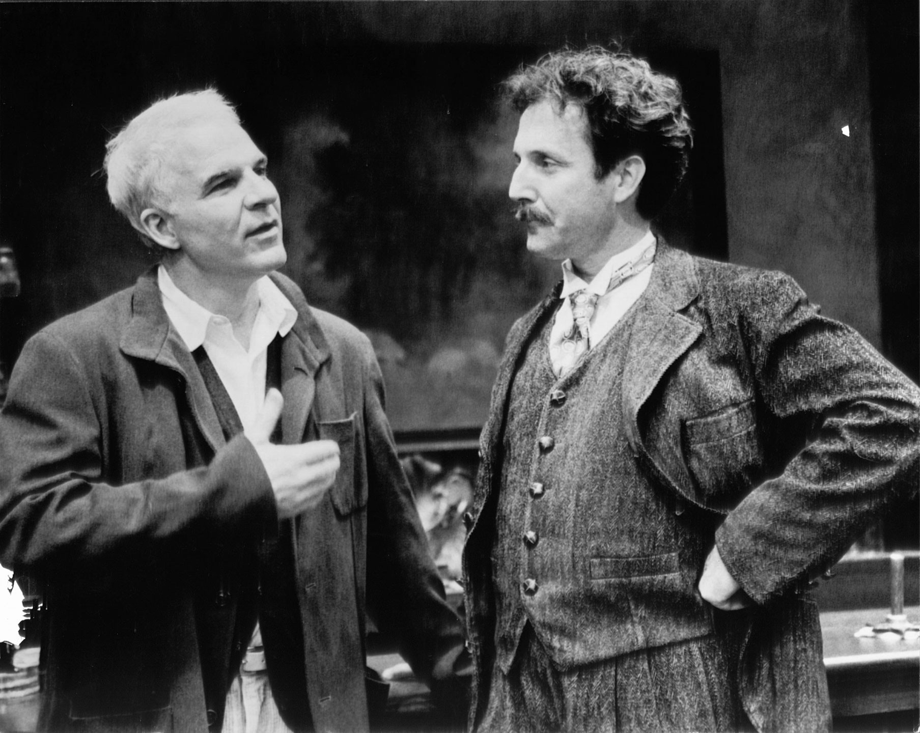Actor/director/playwright Steve Martin speaks with actor Dan Hiatt on set at Ford's Theatre. Martin is playwright of "Picasso at the Lapin Agile" on stage at Ford's in 1998.