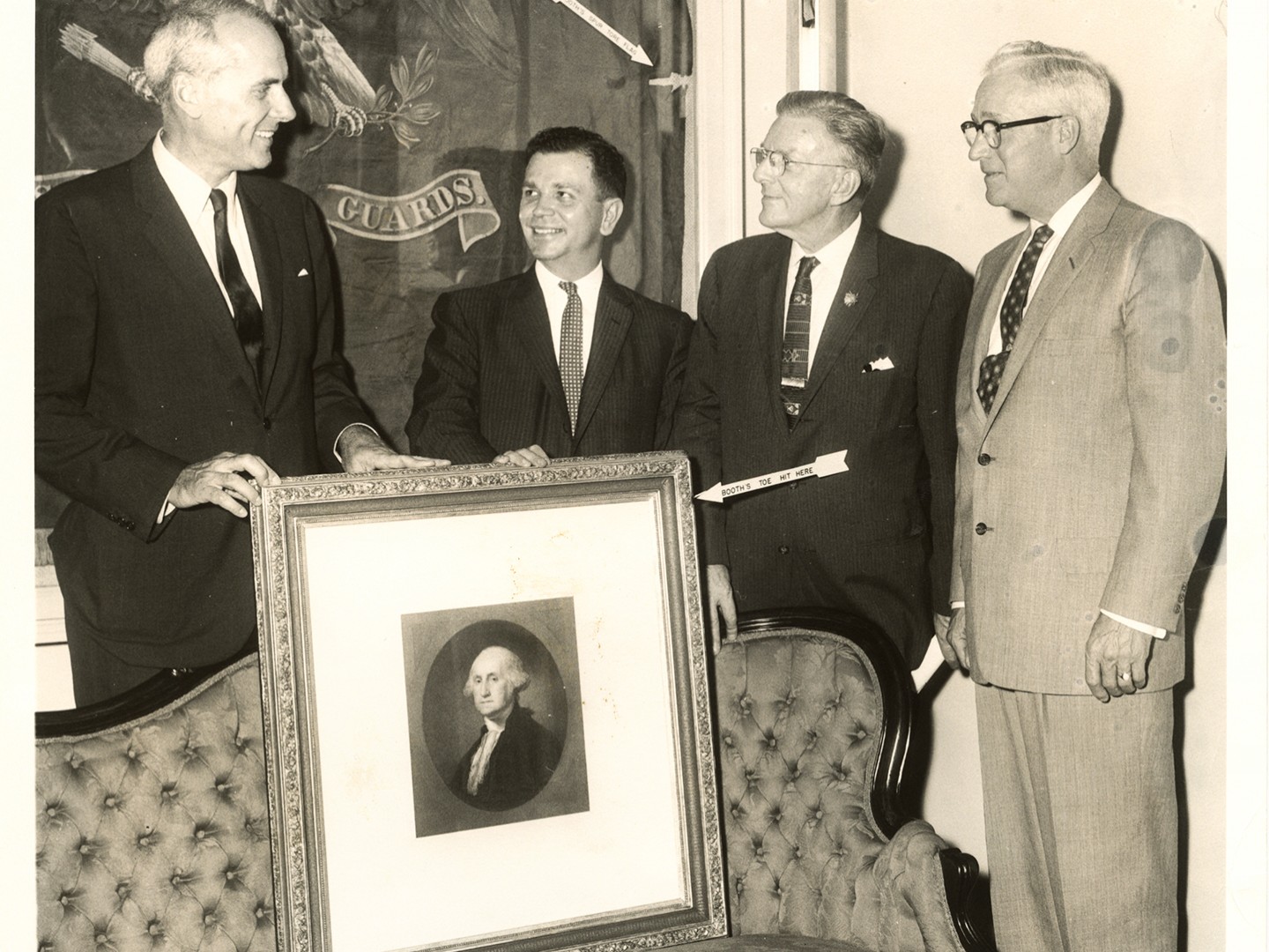 Photo from 1959 shows Addison Reece standing with three other men in business suits above the original George Washington portrait, the sofa from the Presidential Box. Behind them is the original blur Treasury Flag from Ford's.