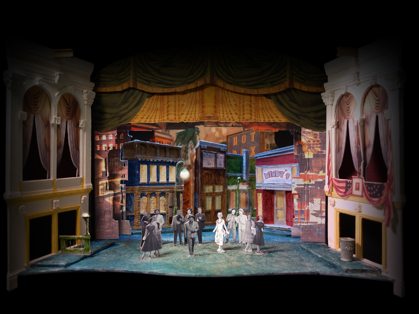 Set design for "Guys and Dolls" at Ford's Theatre features Times Square buildings in bright, primary colors.