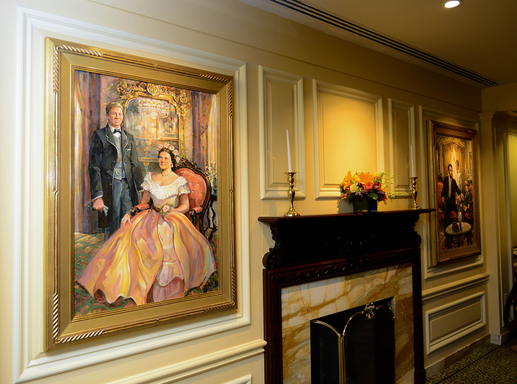 A painting of Abraham and Mary Lincoln hangs near a fireplace in the lobby of the Willard Hotel in Washington, D.C.