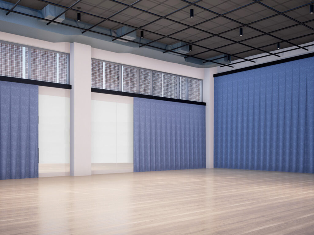 Rendering of a multipurpose studio for rehearsals, student programs and new public programming. Large empty room with high ceilings, large windows from the ceiling down around the top 3rd of the room, wood floors and adjustable blue curtains that can cover the walls.