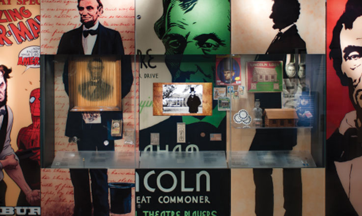 A cartoon of Lincoln with Spiderman, a color portrait of Lincoln standing, a green-faced Lincoln portrait, a life-size silhouette of Lincoln standing and an enlarged portrait of Lincoln’s head and shoulders.