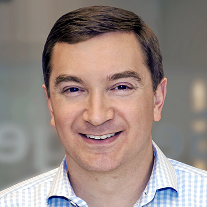 Headshot of Bloomberg executive Josh Eastright.