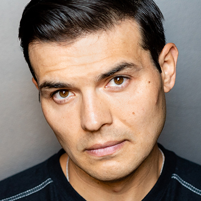 An actor who identifies as a Native American/Mexican man.