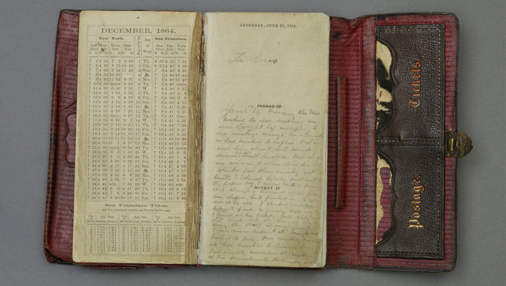 A nineteenth century leather-bound diary open to a tide chart for December 1864, along with a page filled with hand-written notes.